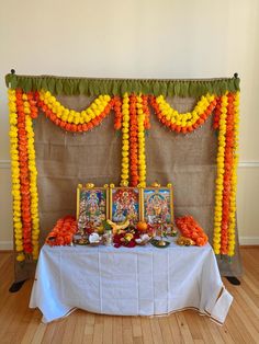 a table with decorations on it and the words poja decoration ideas above it for diwaling