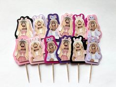 a bunch of toothpicks that have pictures of women in bunny costumes on them