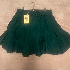 Very Soft & Comfy! Fits True To Size! Great Condition! Never Worn!! Spring Green Skort With Ruffles, Green Ruffled Skort For Spring, Chic Green Flowy Bottoms, Chic Flowy Green Bottoms, Green Skirted Bottoms With Ruffle Hem, Green Bottoms With Ruffle Hem, Green Ruffled Skirted Skort, Green Flowy Mini Skirt With Ruffles, Green Ruffled Mini Skort