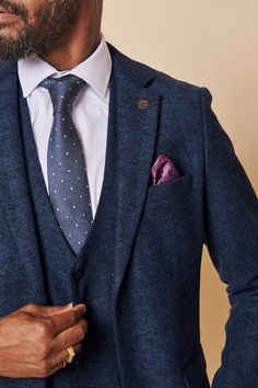 This men's navy tweed blazer is a perfect blend of style and sophistication. Made from a premium wool poly mix fabric, this blazer is sure to make an impact wherever you go and is sure to last for years to come. Upgrade your everyday look with this timeless piece. Perfect for workwear or wedding attire. Model wears size 38R. Features Slim fit Fully lined Single-breasted Peak lapel Single back vent Four button cuff Double button fastening Complimentary pocket square Functional inside and outside Navy Suit Wedding, Tweed Wedding, Tweed Wedding Suits, Wedding Waistcoats, Black Suit Wedding, Tan Suit, Tweed Waistcoat, Tweed Trousers, Tweed Suit