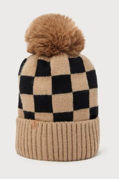 The Lulus Embracing the Cozy Light Brown Checkered Pom Pom Beanie is essential for dressing the part for the chilliest of days! Pass any vibe check with this totally trendy knit beanie that boasts a cool checkered design throughout the classic silhouette, along with a ribbed upturned cuff and a soft faux fur pom pom at the top that completes this seasonal favorite look. Fabric: Fabric is very stretchy. Beanie measures 11" tall with 17" opening (relaxed). Body: 100% Acrylic. Faux Fur: 100% Polyes Casual Plaid Hat For Fall, Casual Super Soft Hats For Cold Weather, Casual Acrylic Hats For Fall, Trendy Acrylic Hat For Fall, Casual Brown Acrylic Beanie, Fur Pom Pom Beanie, Brown Checkered, What Is Trending Now, Checker Design