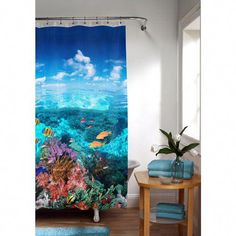 a shower curtain with an underwater scene on it