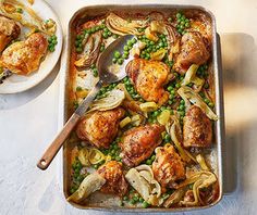 a pan filled with chicken, peas and onions