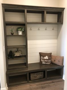 the entryway is clean and ready to be used as a storage area for shoes