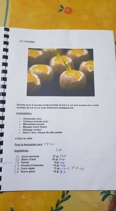 a recipe book with an image of oranges on it