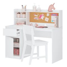 a desk and chair with a corkboard on the wall behind it that has a unicorn head