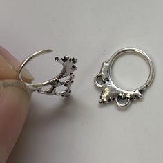 "These are so pretty and light. Made is 925 sterling silver with tribal details. The rings are all 10mm (1cm or .40\") in diameter. The wire is 18 gauge. They are only finished on one side since each one is made BY HAND so there may be very slight differences. One of the images contains numbers to specify which you would like from the drop down menu." Adjustable Nickel Free Silver Body Jewelry, Adjustable Nickel-free Silver Body Jewelry, Silver Internally Threaded Hoop Body Jewelry, Nickel Free Silver Piercings, Nickel Free Round Silver Piercings, Nickel-free Round Silver Piercings, Bohemian Nickel-free Round Septum Ring, Dainty Silver Internally Threaded Body Jewelry, Nickel-free Silver Bohemian Septum Ring