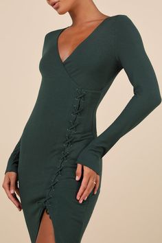 Everyone will be charmed by your flirty look in the Lulus Trendsetting Desire Green Ribbed Jersey Knit Lace-Up Midi Dress! Soft and stretchy ribbed jersey knit shapes this essential dress that has long sleeves and a surplice neckline. Fitted bodice continues down to a lace-up detail that runs down the side of the column-style skirt with a sultry side slit and an ankle-grazing midi hem. Fit: This garment fits true to size. Length: Mid-calf length. Size medium measures 49.5" from shoulder to hem. Green Ribbed Dress, Jersey Knit Dress, Knit Lace, Essential Dress, Ribbed Dress, Surplice Neckline, Style Skirt, Lace Knitting, Fitted Bodice