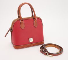 A classic carry that holds its shape and works as a shoulder bag or crossbody, this pebble leather satchel is coming with to every sophisticated destination. From Dooney & Bourke. Pebbled Leather Satchel For Travel In Fall, Fall Travel Satchel In Pebbled Leather, Pebbled Leather Satchel For Daily Use In Fall, Fall Pebbled Leather Satchel For Daily Use, Fall Satchel With Detachable Strap And Pebbled Leather, Fall Pebbled Leather Satchel With Detachable Strap, Dooney And Bourke, Dooney & Bourke, Leather Satchel