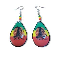 Add some reggae vibes to your accessory collection with these BOB MARLEY Earrings! These 2" tall x 1" wide earrings feature a stunning Tear Drop Pendant that is sure to turn heads. The vibrant colors and solid black back make these earrings a must-have. Plus, with orders usually shipping in just 24-48 hours, you won't have to wait long to rock these beauties! We Also Have Bob Marley Necklaces... Adjustable Funky Earrings For Festivals, Rasta Lion, Tear Drop Pendant, Black Back, Drop Pendant, Bob Marley, Tear Drop, Back To Black, Solid Black