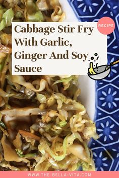 cabbage stir fry with garlic, ginger and soy sauce in a white bowl on a blue plate