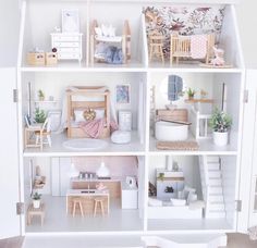 a doll house with all the furniture and accessories