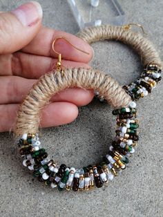 Large hoop earrings with small crystal, plastic and metal stones in different shades of gold and green. Diameter 5 cm. Being handmade, the models are always unique. Keep in mind that the process to make them is laborious, from picking flowers, drying them for a few weeks, applying the resin and letting it dry for 1 day, sanding and polishing by hand. It takes up to a few weeks to finish it. Please consider this time (plus shipping) when purchasing. Boho Hoop Earrings, Picking Flowers, Gold And Green, Shades Of Gold, Large Hoop Earrings, Natural Jute, Jewelry Earrings Hoops, Sanding, 1 Day