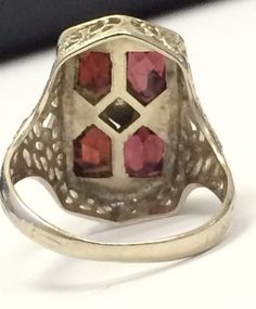 "VINTAGE 14K WHITE GOLD ANTIQUE GARNET ART DECO COCKTAIL RING BEAUTY!! Size 5.25 Each garnet measures approximately 5mm x 4mm Ring face measures 3/4\" high x 6/16\" wide. 3.6 grams One of the garnets are scratched across (see pics). Not cracked through. Shipped insured/delivery confirmation I guarantee item to be exactly as described and pictured." Antique Oval Multi-stone Ring, Antique Multi-stone Yellow Gold Cluster Ring, Antique Multi-stone Cluster Ring In Yellow Gold, Collectible 14k Gold Multi-stone Rings, Antique Signet Ring With 17 Jewels For Anniversary, Collectible Multi-stone 14k Gold Rings, Vintage Multi-stone Diamond Ring For Collectors, Vintage Multi-stone Diamond Ring Collectible, Vintage 14k Gold Cluster Ring Hallmarked