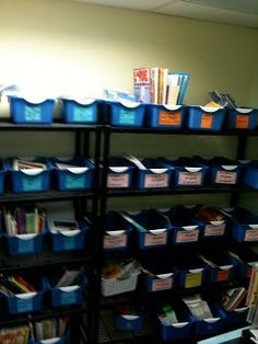 shelves filled with books and folders in an office