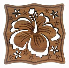 a wooden plaque with an image of a flower