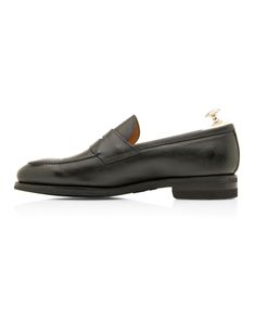 Bontoni Principe Leather Loafer in Black Almond toe Penny strap across vamp Blake construction Tonal stitching Slip-on Soft grain leather upper Leather lining and insole Vibram rubber sole Shoe tree included Made in Italy All sizes listed are in US measurements Evening Jumpsuit, Shoe Tree, Black Loafers, Sole Shoes, Women Men Shoes, Casual Blazer, Black 7, Beauty Gift, Vest Dress