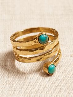 DESTINATION COLLECTION: Designed for dreamers, these pieces reflect the distinctive beauty of the destinations that inspired them, showcasing the striking qualities of semi-precious stones and natural materials as a call to explore- even if only in t Artisan Turquoise Cabochon Ring, Adjustable Nickel-free Turquoise Open Ring, Artisan Agate Cabochon Rings, Artisan Multi-stone Turquoise Ring, Coil Ring, Adjustable Nickel-free Bohemian Turquoise Ring, Banana Republic, Semiprecious Stones, Precious Stones