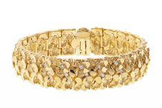 A timeless solid 14k gold nugget bracelet with embedded diamonds measuring 9 inches in length and the width is 17mm or Just under 9/16 inch in width. Made In USA Nugget Bracelet, Gold Nugget, Gold Diamond, Made In Usa, Ring Size, Diamonds, Yellow Gold, Bracelet, Yellow