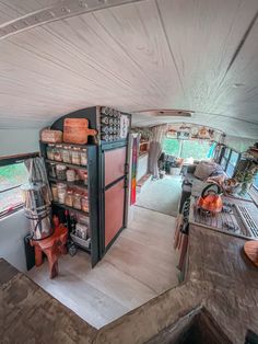 the inside of a camper with lots of storage