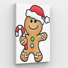 a christmas ginger with a santa hat and candy cane on it's chest canvas wall art print