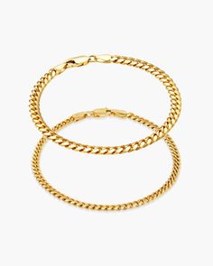 Wrap your wrist in luxury with our gold Cuban Link Bracelet Stack, a showcase of strength and sophistication. The combination of a commanding 5mm gauge and a sleek 3mm design adds a dynamic contrast to this stack. Crafted from premium 925 sterling silver and enduring 14k gold, each link reflects timeless craftsmanship, making this stack an emblem of enduring style and refined masculinity. Gold Bracelets For Men, Gold Cuban Link Bracelet, Gold Bracelet Stack, Gold Bracelets Stacked, Cuban Link Bracelet, Gold Bond, Solid Gold Chains, Gold Bracelets, Silver Shop