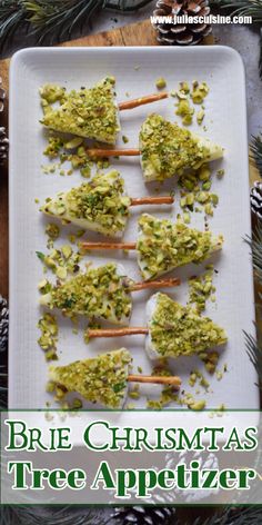 broccoli and cheese appetizer on a white platter with pine cones