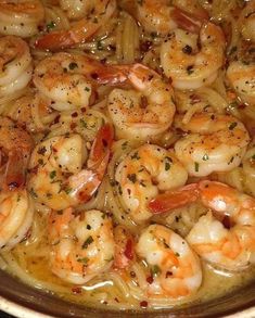 cooked shrimp with garlic and pepper in a pan