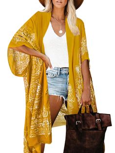 PRICES MAY VARY. Material: This coverup made of very lightweight and breathable fabric,super soft and comfortable Measurements: Length - 37.4in/95cm. Width - 35.4in/90cm,one size fits most, styled in loose-fit,perfect for any body types Design:Open front kimono style,unique mustard yellow boho floral print, airy silhouette with side vents finish an outfit, kimono sleeves complete the look Occasions: The women beach coverup not only suit for vacation,beach and pool wear in summer,also can be a su Coverups Beach, Outfit Kimono, Gilet Kimono, Moda Kimono, Yellow Kimono, Cardigan Summer, Swimsuit Coverups, Kimono Beach Cover Up, Pool Wear