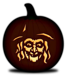 a carved pumpkin with an image of a man's face in the shape of a witch