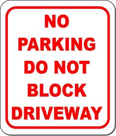 a red and white sign that says no parking do not block driveway