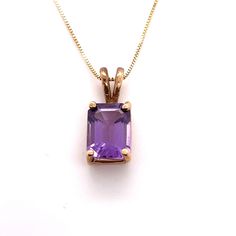 "Yellow Gold Emerald Cut Amethyst Solitaire Pendant Perfect for everyday wear a special occasion and makes the perfect gift.  Details:  Emerald Cut Amethyst approx 8mm x 6mm                14KT Yellow Gold                Pendant Measures Approx 14.7mm x 6mm Wide                Weight 2 Grams                 Comes on a Standard 18\" Yellow Gold Chain Comes in a presentable gift box" Classic Purple Necklace For Anniversary, Classic Amethyst Necklace For Gift, Classic Amethyst Birthstone, Classic Amethyst Purple Necklace, Classic Purple Amethyst Necklace, Classic Purple Necklace For Gift, Jewellery Video, White Gold Cross Pendant, Jewelry Post