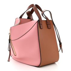 LOEWE Calfskin Small Hammock Shoulder Bag Pastel Pink Tan 1497841 | FASHIONPHILE Pink Leather Hobo Bag For Travel, Pink Leather Shoulder Bag With Leather Lining, Pink Satchel Shoulder Bag With Leather Lining, Pink Leather Top Handle Hobo Bag, Pink Calf Leather Bag With Detachable Strap, Pink Leather Bags With Leather Lining, Pink Leather Hobo Bag With Detachable Strap, Pink Leather Rectangular Hobo Bag, Pink Rectangular Leather Hobo Bag