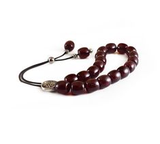 "Handcrafted Komboloi - Worry Beads made of high quality acrylic beads in burgundy color and silver tone metal Master Bead. This durable and pocket sized Komboloi is ideal for everyday use for passing time and relaxation. It would also be great for gift giving. Item can be made with different cord color. Please choose the cord color you would like from the drop down menu. Features: Item Length: approx. 26cm / 10\" Bead Size: 13x13mm / 0.50x0.50\" Bead Type: Acrylic Bead Color: Burgundy - Dark Re Adjustable Polished Amber Beads, Worry Beads, Popular Necklaces, Red Bead, Prayer Beads, Burgundy Color, Necklace Sizes, Acrylic Beads, Metal Beads