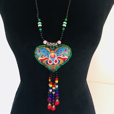 Beautiful, Exquisite, Eye-Catching Handmade Boho Bohemian Hand Embroidered Beaded Long Necklace. Brand New In Packaging. Traditional Multicolor Heart Beads Necklace, Multicolor Heart Beaded Necklaces, Bohemian Multicolor Embroidered Beaded Necklaces, Multicolor Embroidered Jewelry For Festivals, Multicolor Embroidered Bohemian Necklace, Multicolor Bohemian Embroidered Necklace, Bohemian Embroidered Beaded Necklaces As Gift, Bohemian Beaded Necklace With Heart Beads For Festivals, Bohemian Red Beaded Necklace With Heart Beads