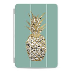 an ipad case with a gold pineapple on the front and blue back, against a light green background