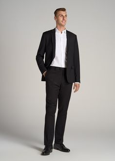 About Our Suit Trousers for Tall Men Crisp, classic and comfortable. That’s what you’ll find in these suit trousers for tall men. Thoughtfully designed for men from 6’ to 7’1, these pants have an extended inseam for longer legs without the extra bagginess you usually find in a longer pant. They’re made with a slightly stretchy polyester blend and feature a comfortable cotton-blend lining. These men’s tall pants feature a tailored fit for a modern look that’s easy to wear from the office to the e Suit Without Tie, Men's Black Suit, Black Suit Trousers, Suit With Vest, Prenuptial Photoshoot, Longer Legs, Jeans Outfit Men, Black Suit Men