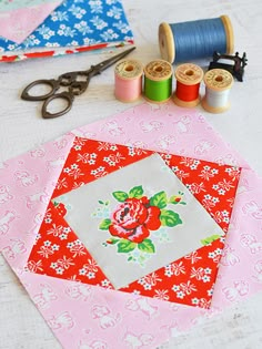 sewing supplies are laid out on the table to be used as wall hangings and decorations