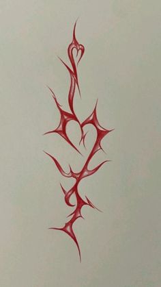 a red tattoo design on a white paper with the word love written in black ink