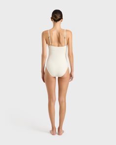 The Aerin One Piece in Pearl is an elegant, contemporary swimsuit with a flattering square neckline. With a bust panel, hidden under-bust support and removable cups, Aerin is supremely flattering to a woman's figure. Cut from our technically advanced Sculpteur® fabric with 3-D stretch, Aerin will support the bust and streamline the body. A chic swimsuit that idea for larger busts, suiting cup sizes B to DD. Luxury fabric sustainably made in Italy. Large Bust Swimwear, Swimsuit Aesthetic, Chic Swimsuit, Button Front Maxi Dress, Luxury Fabric, Women Figure, Cup Sizes, One Piece Swimsuits, Designer Swimwear