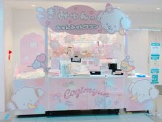 an ice cream stand with hello kitty decorations