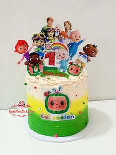 there is a cake decorated with cartoon characters on it