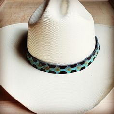 Adjustable with leather ties Handmade from Genuine Leather Embossed Hide Sourced and Made in Texas Custom Adjustable Straw Hat For Country Events, Custom Adjustable Straw Hat For Rodeo, Handmade Southwestern Blue Hat Band, Handmade Blue Hat Bands For Rodeo, Blue Adjustable Wide Brim Hat Bands, Handmade Blue Western Hat, Custom Adjustable Summer Hat Bands, Handmade Blue Hat Band For Rodeo, Handmade Blue Hat Bands For Western-themed Events