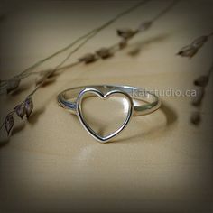 "Jewelry by Katstudio Heart Ring, love ring, silver ring, open heart ring, love ring, silver love ring, sterling silver heart ring, handmade, Sterling Silver 925, Valentine's Day, kat studio Materials: sterling silver 925 Dimension: Heart 3/8x3/8\", band half-round wire 2x1 mm. (12 gauge) Finish: shiny polished. This ring can be made into size 3 to 11 US , including half size. Before ordering please see my shop policies for important information: www.etsy.com/shop/Katstudio/policy Thank You! Kat Love Ring Silver, Celtic Heart Knot, Infinity Knot Ring, Open Heart Ring, Love Knot Ring, Celtic Knot Ring, Silver Heart Ring, Ring Trends, Chevron Ring