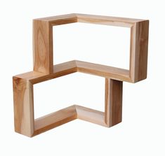 three wooden cubes stacked on top of each other in the shape of a rectangle