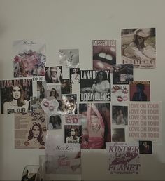 a white refrigerator covered in pictures and magnets