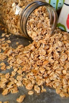 a jar filled with oats sitting on top of a table