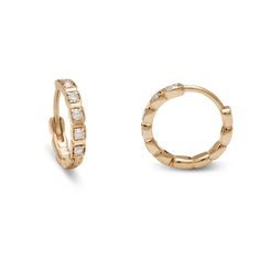 Details Huggie hoops in 14k yellow gold with approximately 0.08ct white diamonds. Sold as singles or a pair. Each diamond is unique and may vary in shade and appearance from what is depicted on the site. Description The Wheat Hoops are equal parts delicate and striking like the harness rings they are named for, shown here with a row of channel set white diamonds in 14k yellow gold. Timeless 14k Gold Huggie Earrings With Diamond Accents, 14k Gold Huggie Diamond Earrings, Yellow Gold Small Hoop Diamond Earrings, 14k Gold Huggie Diamond Earrings With Single Cut Diamonds, Small Hoop Yellow Gold Diamond Earrings, Yellow Gold Diamond Hoop Earrings With Accents, 14k Gold Hoop Earrings With Single Diamond, Everyday Yellow Gold Diamond Hoop Earrings, Everyday Yellow Gold Diamond Huggie Earrings