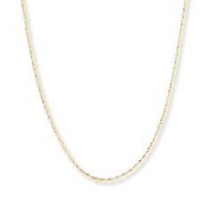 This sleek Singapore chain necklace for her is styled in 14K yellow gold. The 18-inch necklace secures with a lobster clasp. 20 Inch Necklace, Jewelry Education, Jewelry Advice, 16 Inch Necklace, Jared The Galleria Of Jewelry, Jewelry Photography, Yellow Gold Chain, Accessories Jewelry Necklace, Boho Necklace