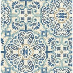 a blue and white wallpaper with an ornate design